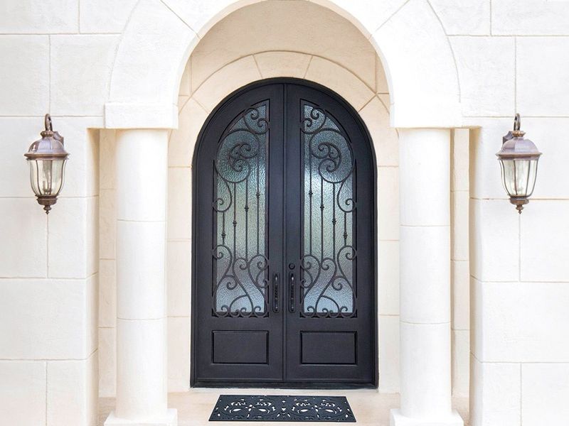 Wrought Iron door installation in Austin, Tx.